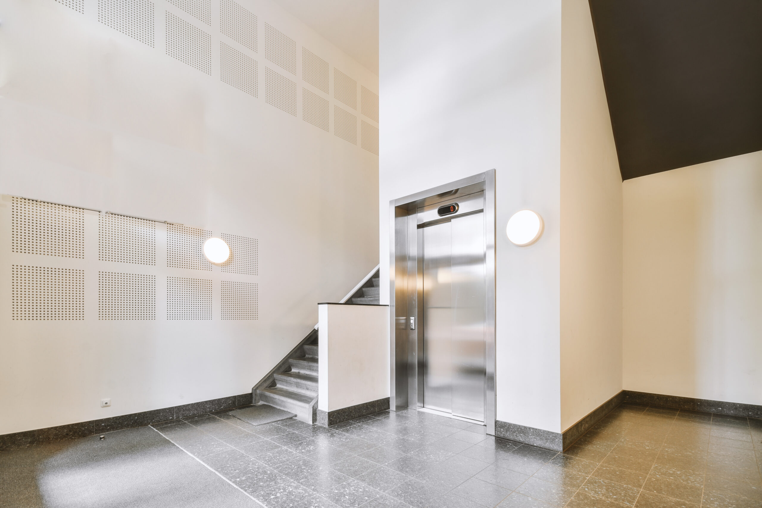 Modern elevator in apartment building hall